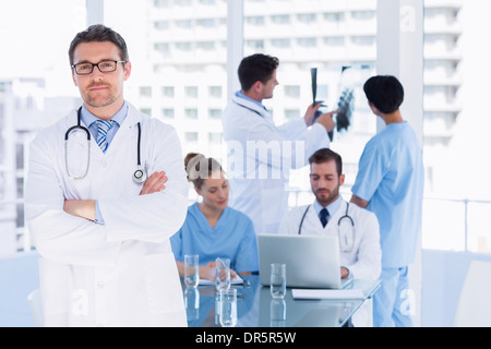 Doctors at work in medical office Stock Photo
