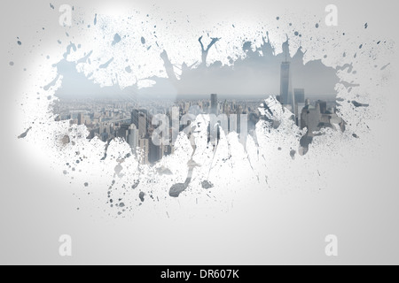 Splash on wall revealing cityscape Stock Photo