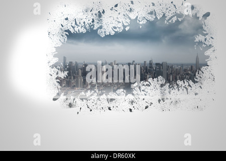 Splash on wall revealing cityscape Stock Photo