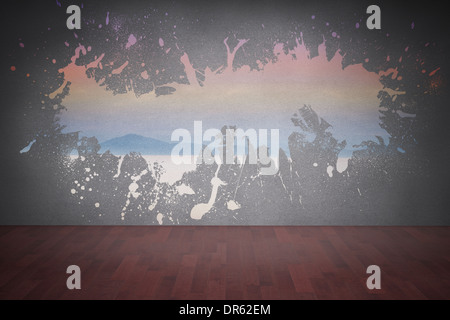 Splash on wall revealing desert landscape Stock Photo