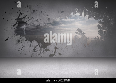 Splash on wall revealing desert landscape Stock Photo