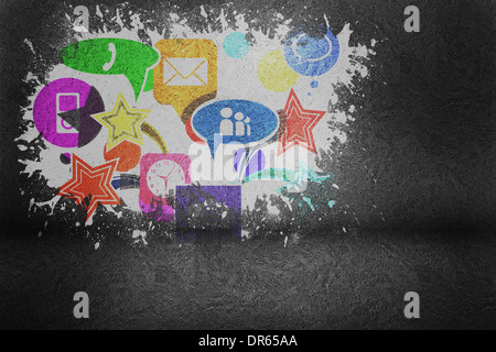 Splash on wall revealing applications Stock Photo