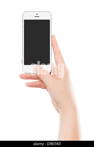 Female hand holding white modern smart phone with blank screen and pressing button by the thumb. Isolated on white background. Stock Photo