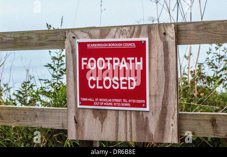 Coastal Footpath closed sign in Scarborough, UK, due to erosion Stock Photo