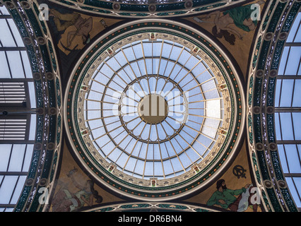 Ornate cast-iron segmental-arched roof trusses with glazed roof dome. County Arcade, Victoria Quarter, Leeds. Stock Photo