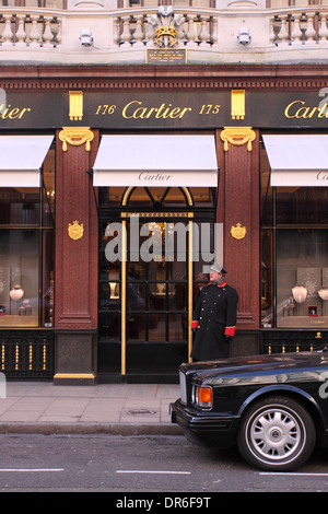 Cartier jewelers Bond Street,  Mayfair London with doorman and Bentley car parked outside UK