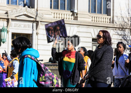 Denver, Colorado USA - 20 Jan 2014. Marchers parade from City Park to Civic Center park at the 28th annual Marade to commemorate Dr. Martin Luther King.  The Marade in Denver is touted as the largest such celebration in the country. Credit:  Ed Endicott/Alamy Live News Stock Photo