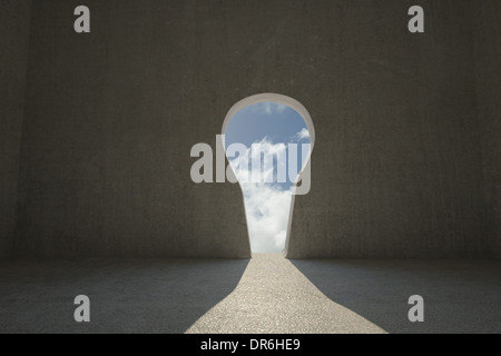 Keyhole door in dark room Stock Photo