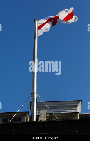 The flag of St George is raised over No.10 Downing Street at St George's Day in London, Britain, on 24 April 2013. Stock Photo