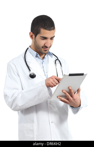 Arab saudi doctor man reading a tablet reader isolated on a white background Stock Photo