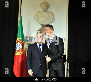 Lisbon, Portugal. 20st Jan, 2014. Portuguese football super star Cristiano Ronaldo (R) poses with Real Madrid President Florentino Perez after being awarded the Grand Officer of the Order of Infante D. Henrique by Portuguese President Anibal Cavaco Silva at the Presidential Palace in Lisbon, Portugal, on Jan. 20, 2014. Ronaldo was awarded the country's top honor for his contribution to the national team and the prestige he has brought for Portugal around the world. Credit:  Zhang Liyun/Xinhua/Alamy Live News Stock Photo