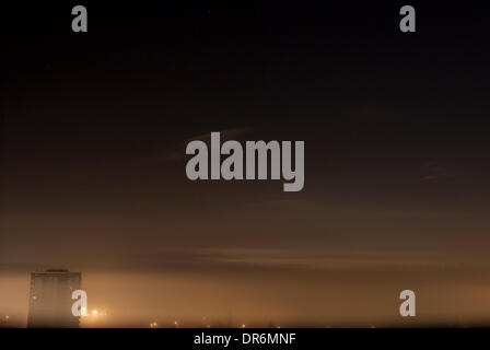 London, UK. 21st Jan, 2014. Heavy fog descends on East London after midnight, London, UK. 21st Jan, 2014. Credit:  kaan diskaya/Alamy Live News Stock Photo