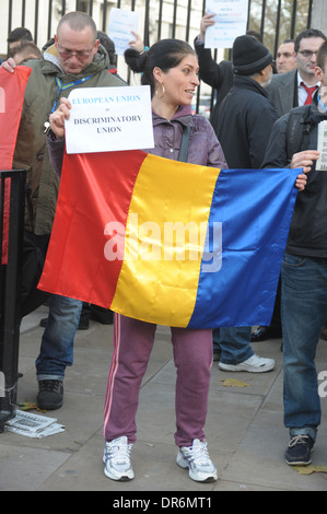 Romanians and Bulgarians unite in protest outside Downing Street against discrimination against them in the UK London 9/12/2013 Stock Photo