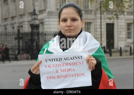 Romanians and Bulgarians unite in protest outside Downing Street against discrimination against them in the UK London 9/12/2013 Stock Photo