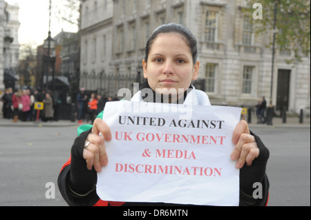 Romanians and Bulgarians unite in protest outside Downing Street against discrimination against them in the UK London 9/12/2013 Stock Photo