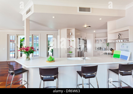modern minimal white kitchen in australian home Stock Photo