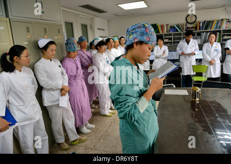 Doctors and nurses daily shift meeting in Beijing Cancer Hospital. 18-Oct-2013 Stock Photo