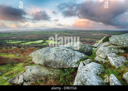 Sunrise at Helman Tor a natural granite rock formation near Bodmin in Cornwall Stock Photo