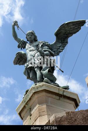 Rome, Italy. 12th May, 2013. Bronze statue of Archangel Michael, standing on top of the Castel Sant'Angelo (Castle of the Holy Angel) in Rome, Italy, 12 May 2013. The statue was modelled in 1753 by Peter Anton von Verschaffelt (1710?1793), replacing the original sculpture of Guglielmo della Porta. Photo: Waltraud Grubitzsch - NO WIRE SERVICE/dpa/Alamy Live News Stock Photo
