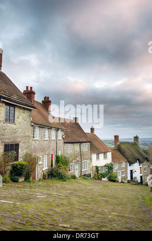 A row of quaint English cottages at Gold Hill in Shaftesbury, Dorset Stock Photo