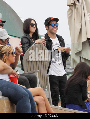 Pete Wentz and his girlfriend Meagan Camper attend an Independence Day house party on Malibu beach Los Angeles, California - 04.07.12 Stock Photo