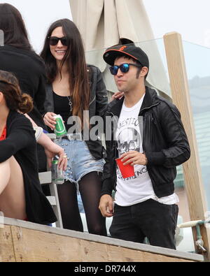 Pete Wentz and his girlfriend Meagan Camper attend an Independence Day house party on Malibu beach Los Angeles, California - 04.07.12 Stock Photo