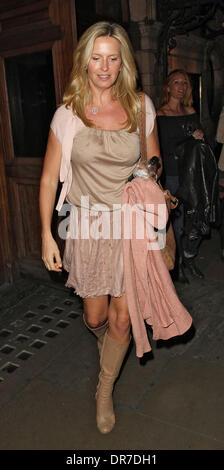 Penny Stewart with a wet stain on the front of her dress takes a cab after watching Singin' in the Rain at the Palace Theatre with family London, England - 14.06.12 Stock Photo