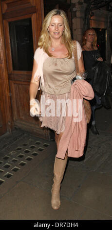 Penny Stewart with a wet stain on the front of her dress takes a cab after watching Singin' in the Rain at the Palace Theatre with family London, England - 14.06.12 Stock Photo