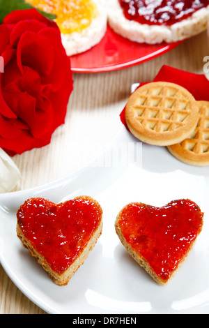 a sweet breackfast with love and red hearths of jam Stock Photo - Alamy