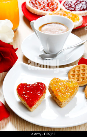 a sweet breackfast with love and red hearths of jam Stock Photo - Alamy