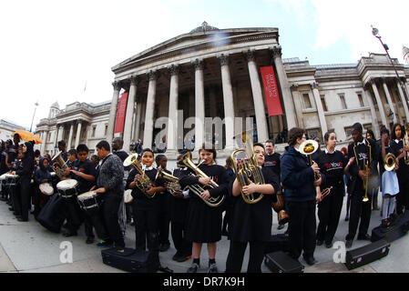 Atmosphere Tayo Irvine Hendrix, daughter of Jimi Hendrix, performs her charity single, 'Champion', with drummers from her Tayouth Foundation in a flash-mob in Trafalgar Square London, England - 15.06.12 Stock Photo