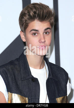 Justin Bieber signing autographs at JR Music World New York