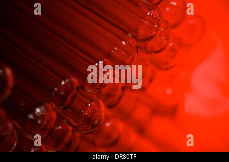 test tubes stacked together in a drawer Stock Photo