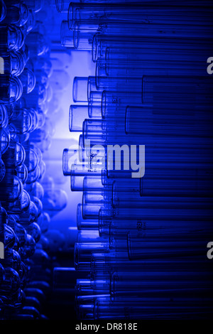 test tube bottles stacked in a drawer Stock Photo