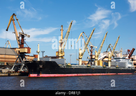 dry cargo ship in port  waiting for coal loading Stock Photo