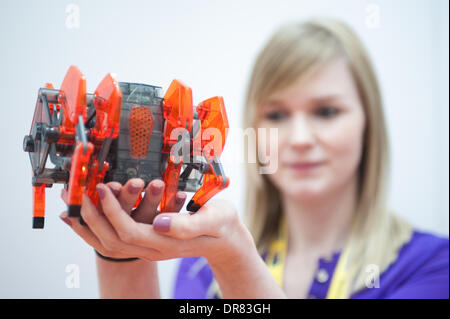 London, UK - 21 January 2014: Kate William holds a Strandbeast by HexBug at the Toy Fair 2014 at Kensington Olympia. Credit:  Piero Cruciatti/Alamy Live News Stock Photo