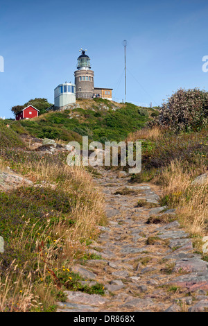 The Kullen Lighthouse by the mouth of Öresund at Kullaberg / Kullens fyr, Höganäs, Skåne / Scania, Sweden Stock Photo