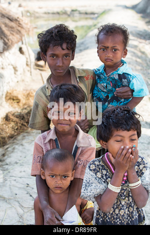 Young children of subsistence farmer in the Sunderbans, Ganges, Delta, India, the area is very low lying and vulnerable to sea level rise. Stock Photo
