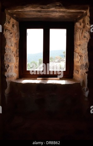 Window of a rustic house. Viewed from inside Stock Photo