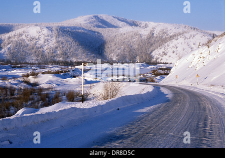 Siberian winter landscape seen from Kolyma Highway in Yakutia, Northeastern Siberia Stock Photo