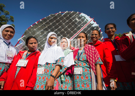 Women building solar cookers at the Barefoot College in Tilonia, Rajasthan, India. The Barefoot College is a worldwide charity, Stock Photo