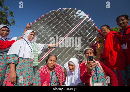 Women building solar cookers at the Barefoot College in Tilonia, Rajasthan, India. The Barefoot College is a worldwide charity, Stock Photo