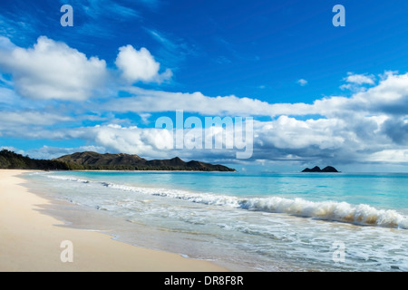 Beautiful Waimanalo and Bellows Beach with the Koolau Mountains and Mokulua islands in the distance Stock Photo