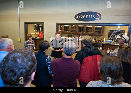 Tour Guide Explaining the Process of Making Bourbon to Tourists at the Wild Turkey Distillery Stock Photo