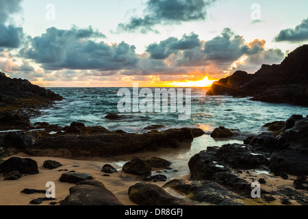 Beautiful peaceful sunrise at Halona Cove, commonly known as Eternity Beach, on Oahu, Hawaii Stock Photo