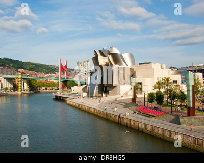 A view of the Guggenheim Museum Bilbao, La Salve Bridge, and Nervion River in Bilbao, Spain. Stock Photo