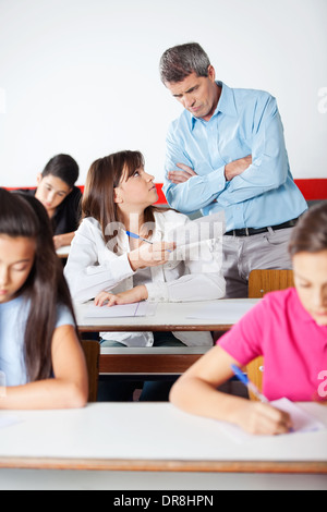 Angry Teacher Looking At Student Stock Photo