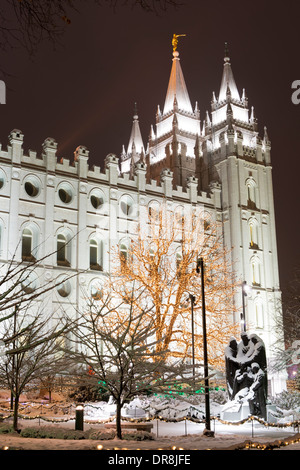 Salt Lake Temple at night in winter with snow and Christmas lights. Stock Photo