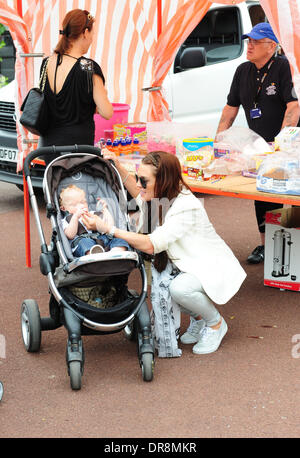 Danielle Lloyd  takes her children to a charity day at Camelot theme park, organised by the Liverpool Taxi drivers association.   Liverpool, England - 20.06.12 Stock Photo
