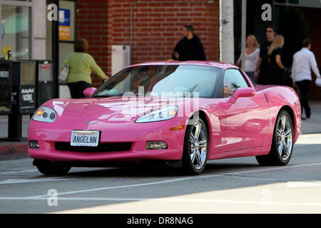 Los Angeles icon, Angelyne drives down the street in Beverly Hills in ...